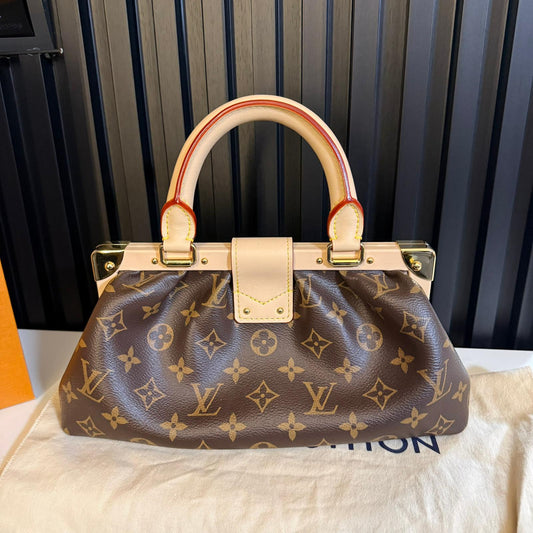 louis Vuitton borsa pochette monogram mono clutch mng vvn M46544